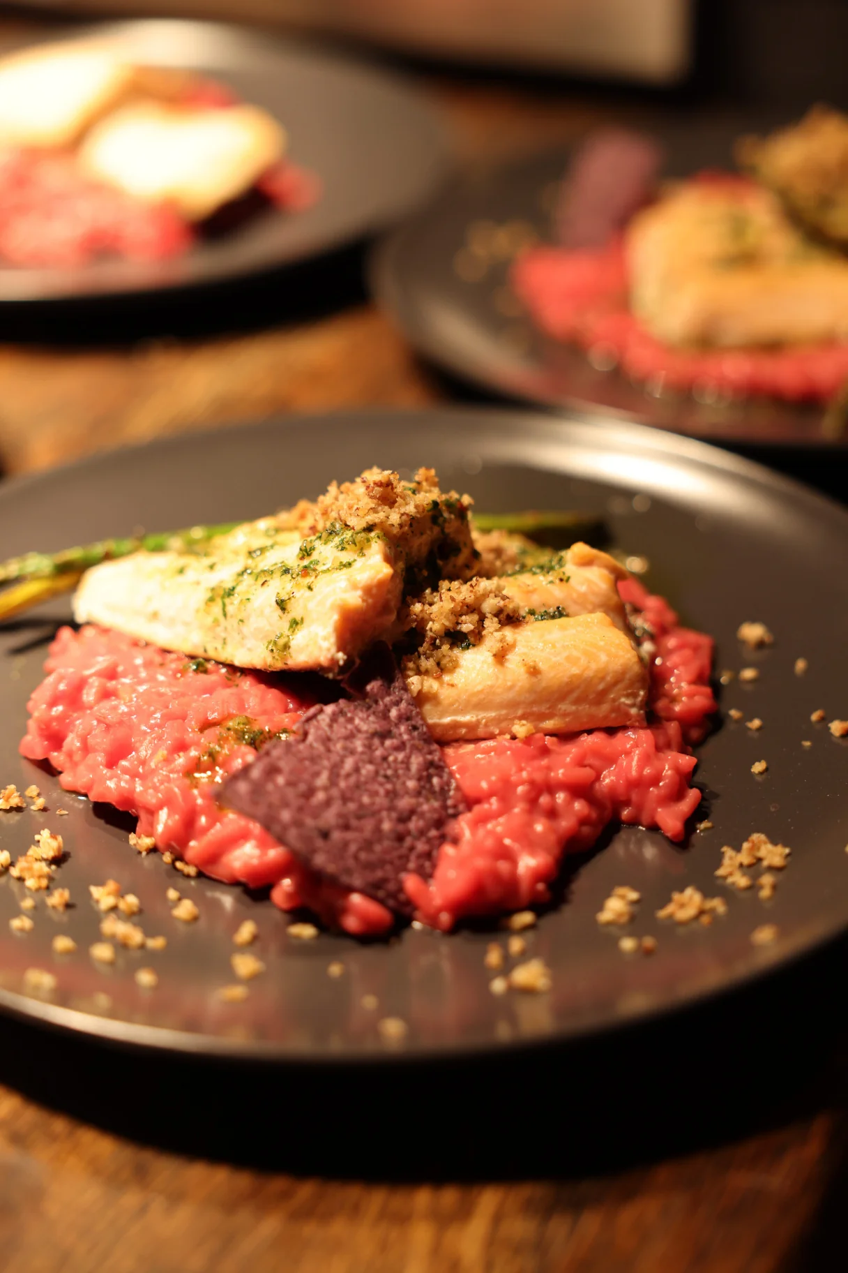 Arctic char on beetroot risotto with herb crumb